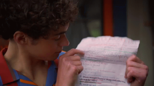 Man Pointing Text In A Paper GIF