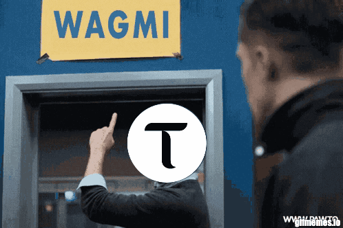Man Pointing to Wagmi Sign