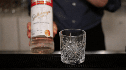 Man Pouring Vodka On Neat Glass GIF