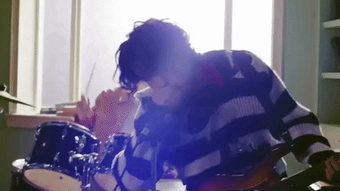 Man Practicing Rimshot In The House GIF