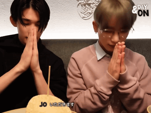 Man Praying Next to Jo