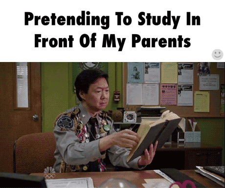 Man Pretending to Read Book in Front of Parents