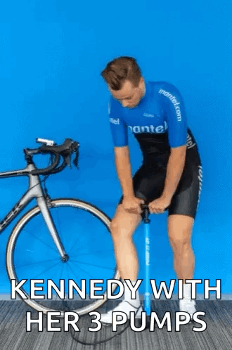 Man Pumping Bicycle Tire Kennedy With Her 3 Pumps GIF
