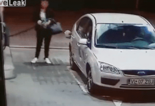 Man Pumping Gas At Gas Station GIF