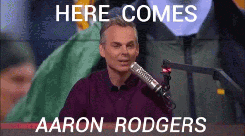 Man Purple Shirt Says Here Comes Aaron Rodgers GIF