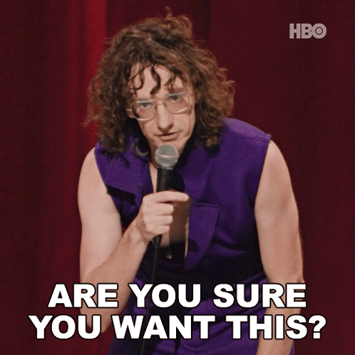 Man Purple Vest Microphone Says Are You Sure