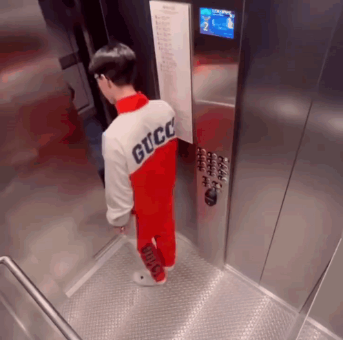 Man Pushing All Elevator Buttons GIF
