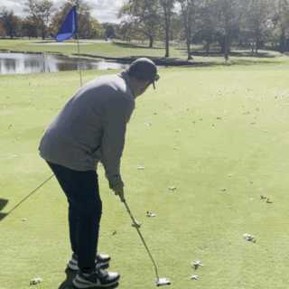 Man Putting Golf Ball GIF