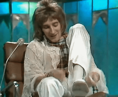 Man Putting on Shoes