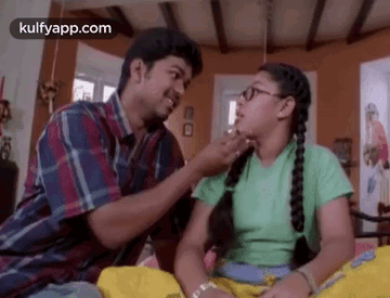 Man Putting Something On Girl's Face GIF
