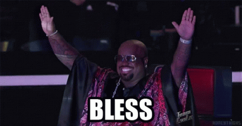 Man Raising Arms Wearing Bless Shirt GIF