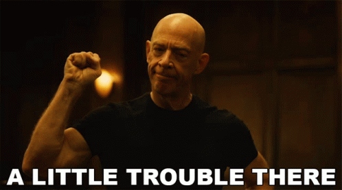 Man Raising Fist Saying A Little Trouble There