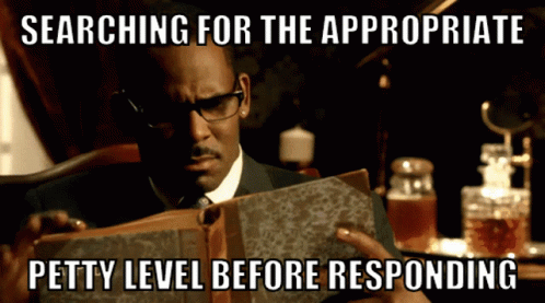 Man Reading Book Searching for the Appropriate Petty Level Before Responding