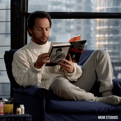 Man Reading Book Wearing Sweater Weather GIF