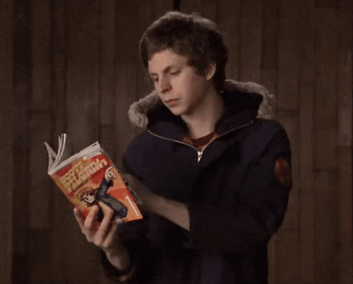 Man Reading Book With Woman Cover