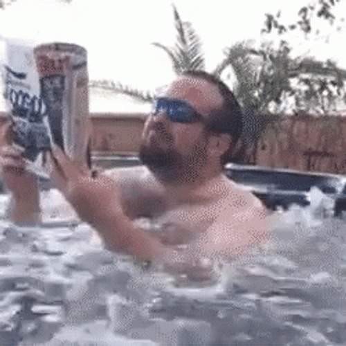 Man Reading In The Hot Tub GIF