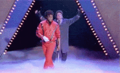 Man Red Jacket White Gloves Walking Through Tunnel