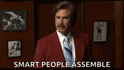 Man Red Suit Blue Tie Smart People Assemble GIF