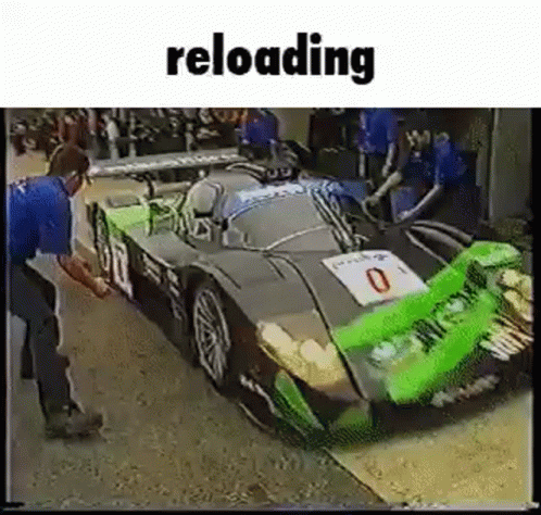 Man Reloading Green Gray Race Car GIF