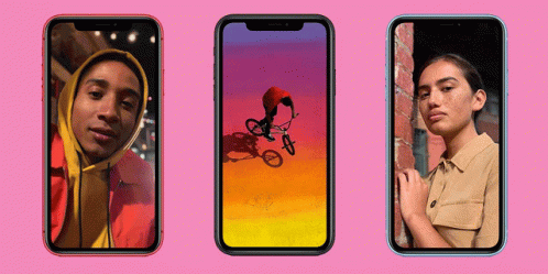 Man Riding Bike And Woman Next To Brick Wall GIF