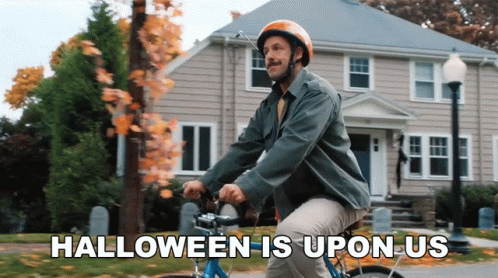 Man Riding Bike Halloween Is Upon Us