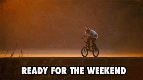 Man Riding Bike In Air Ready For Weekend GIF