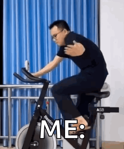 Man Riding Exercise Bike Saying Me GIF