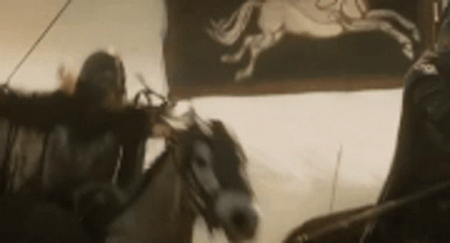 Man Riding Horse in Black and White