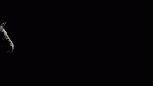 Man Riding Horse In Black And White GIF
