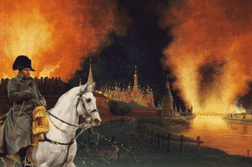 Man Riding Horse in Front of Burning Building