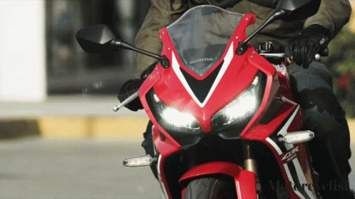 Man Riding Motorcycle on Bridge Cycle World