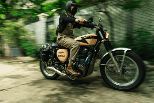 Man Riding Motorcycle Royal Enfield