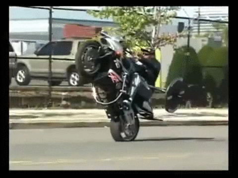 Man Riding Motorcycle While Lifting Barbell Row GIF