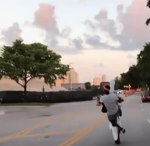 Man Riding Motorcycle With Right Arrow