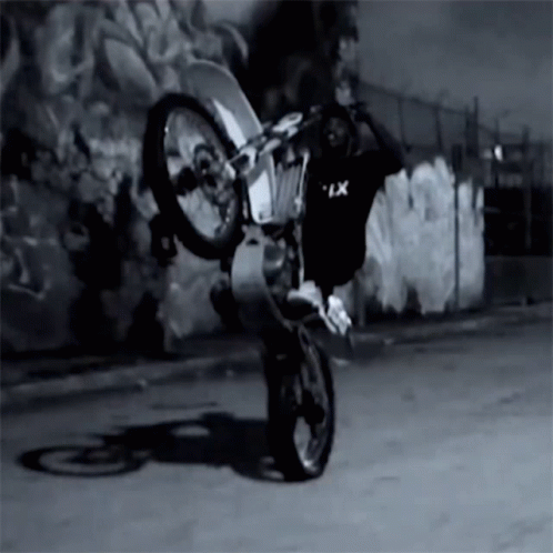 Man Riding Red Motorcycle On Track GIF