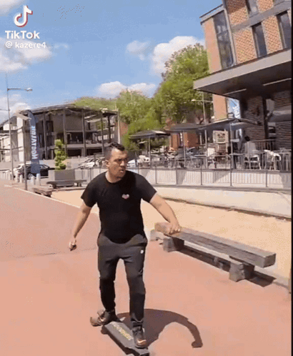 Man Riding Skateboard Past Brewery Sign GIF
