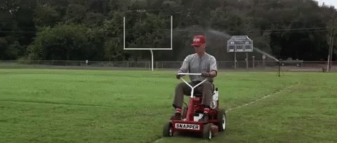 Man Riding Snapper Lawn Mower