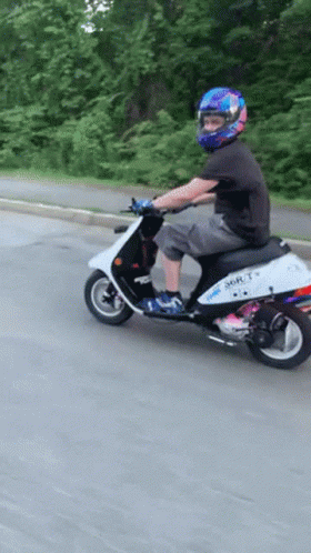 Man Riding Sonic Scooter