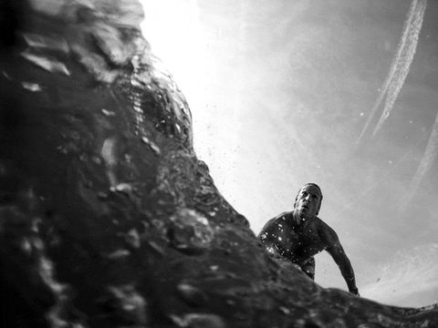 Man Riding The Ocean Waves GIF