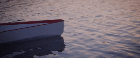 Man Riding The White Canoe GIF