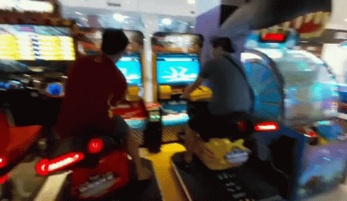 Man Riding Toy Motorcycle GIF