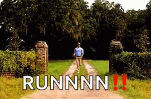 Man Running Down Dirt Road with Runnn