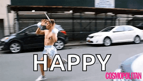 Man Running Down Street With Happy Cosmopolitan