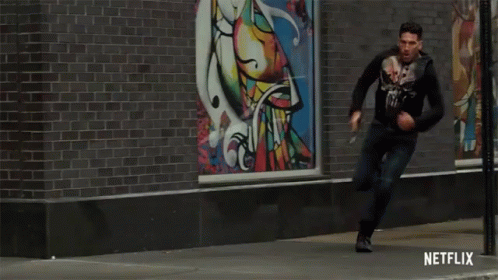 Man Running Down Street with Netflix Logo