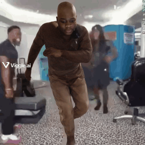 Man Running In Hallway With Viggle Ai Logo GIF