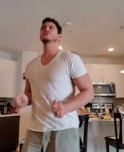 Man Running in Kitchen