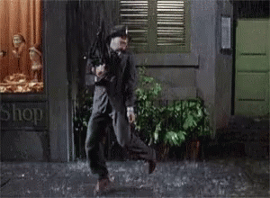 Man Running in Rain Past Store Saying Shop