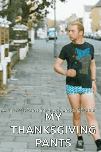 Man Running in Shorts and Black Shirt
