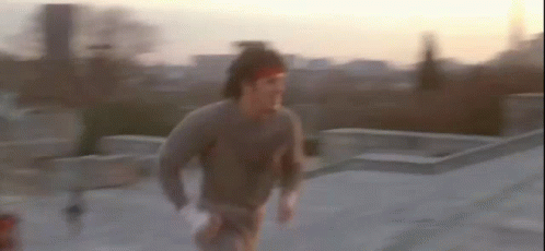 Man Running on Rooftop