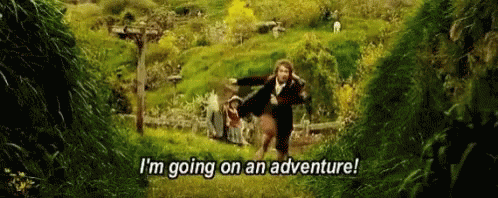Man Running Through Grass Saying Im Going On An Adventure
